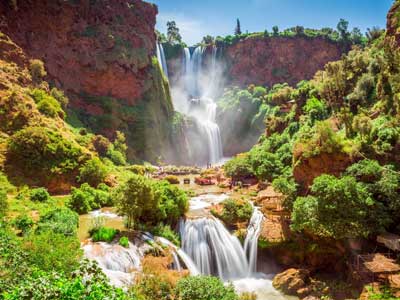 Cascading Ouzoud Waterfalls dropping 110 metres through olive groves in Moroccan countryside